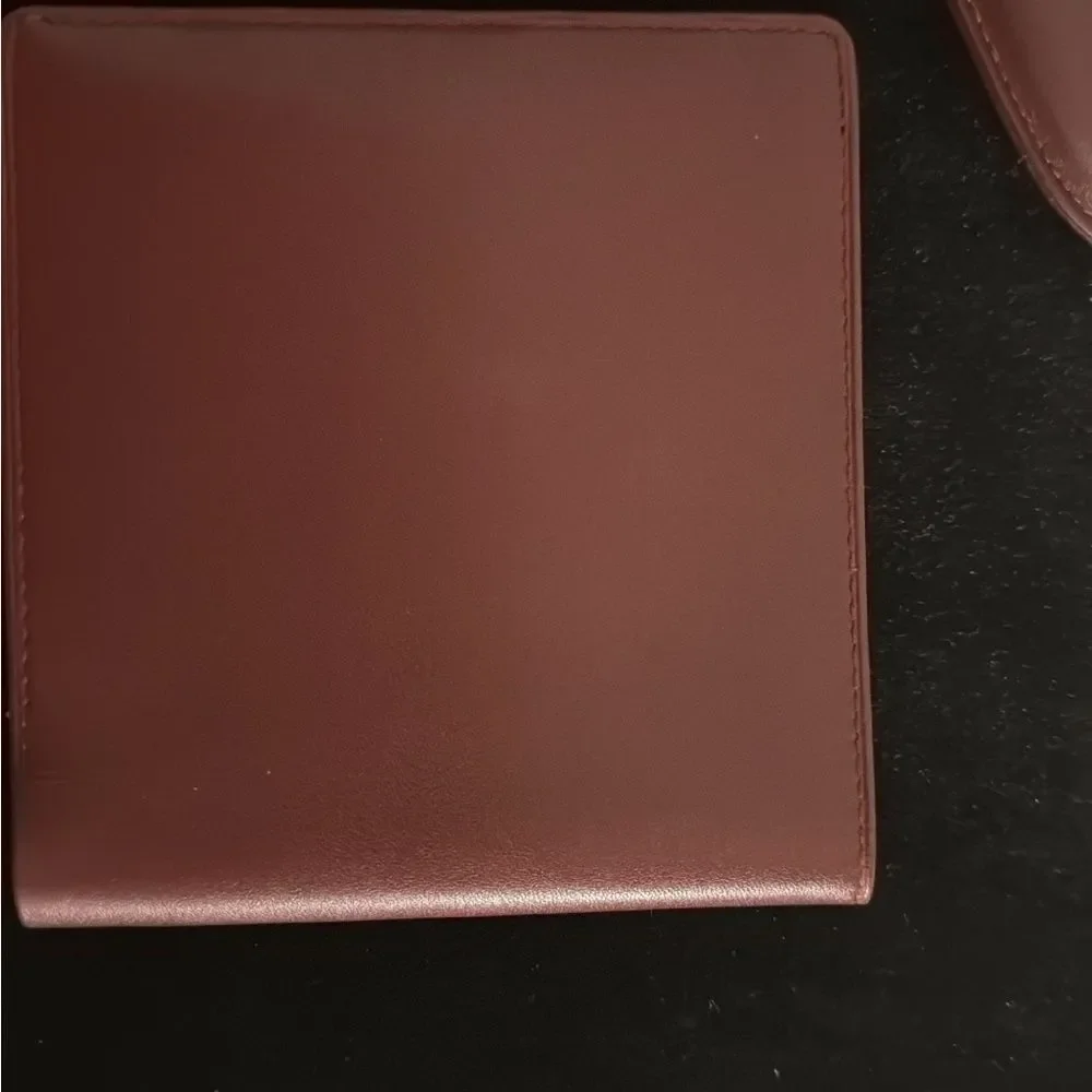 Never used Cartier red burgundy wallet comes with original box